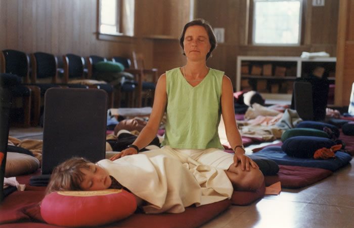 Mother and daughter share a meditative moment.